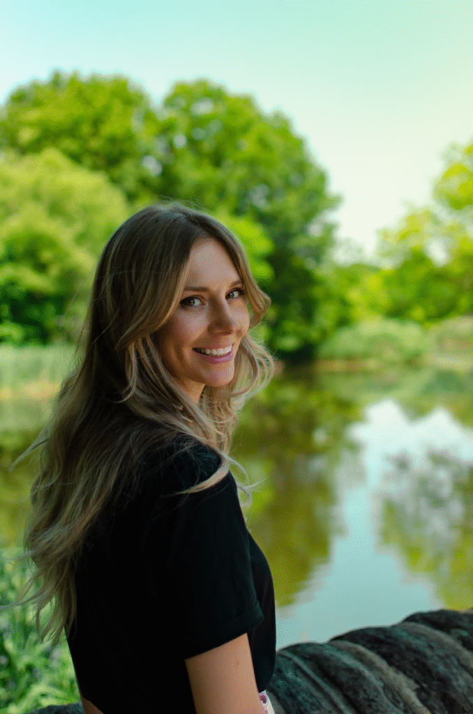 Girl’s Portrait 1 Portrait of a young woman in an black t-shirt standing by the water’s edge in NJ park.