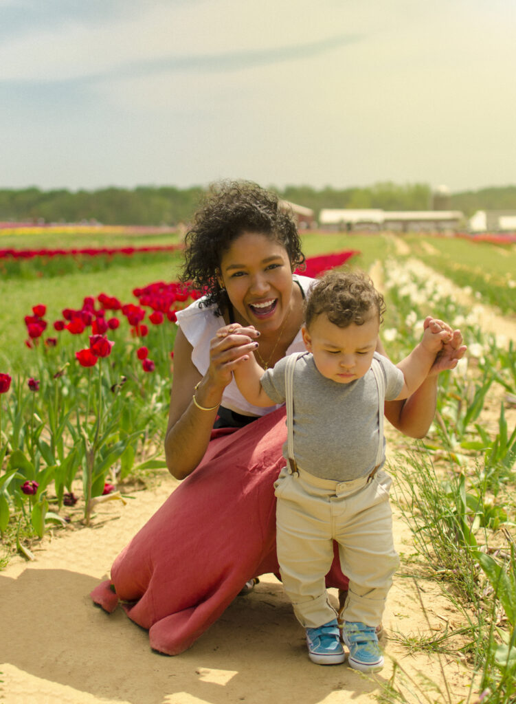 Tulip Farm 2 Close-up portrait of mother and toddler playing among blooming tulips near the Jersey Shore